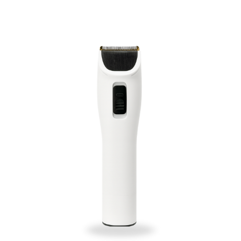 Witte handheld SmartPaw huisdiertrimmer met metalen scheermesje en ronde handgreep op een witte achtergrond